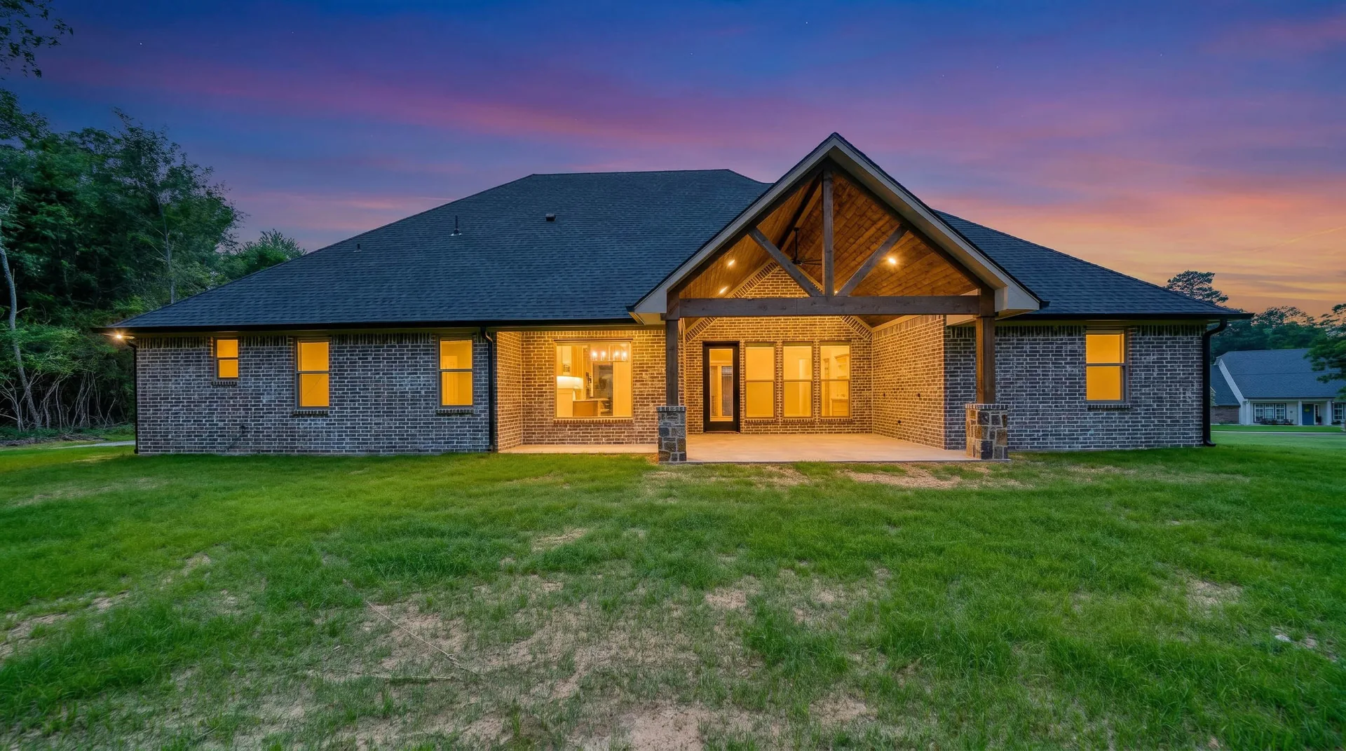 Completed Homes by Noble custom home at twilight, East Texas